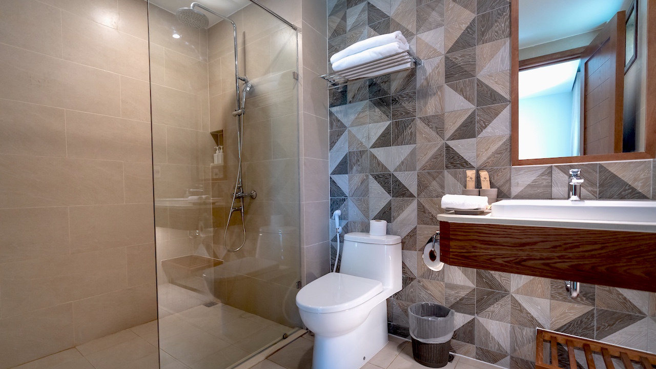 Modern bathroom shower and vanity, the kind of humid space mold inspectors check most often